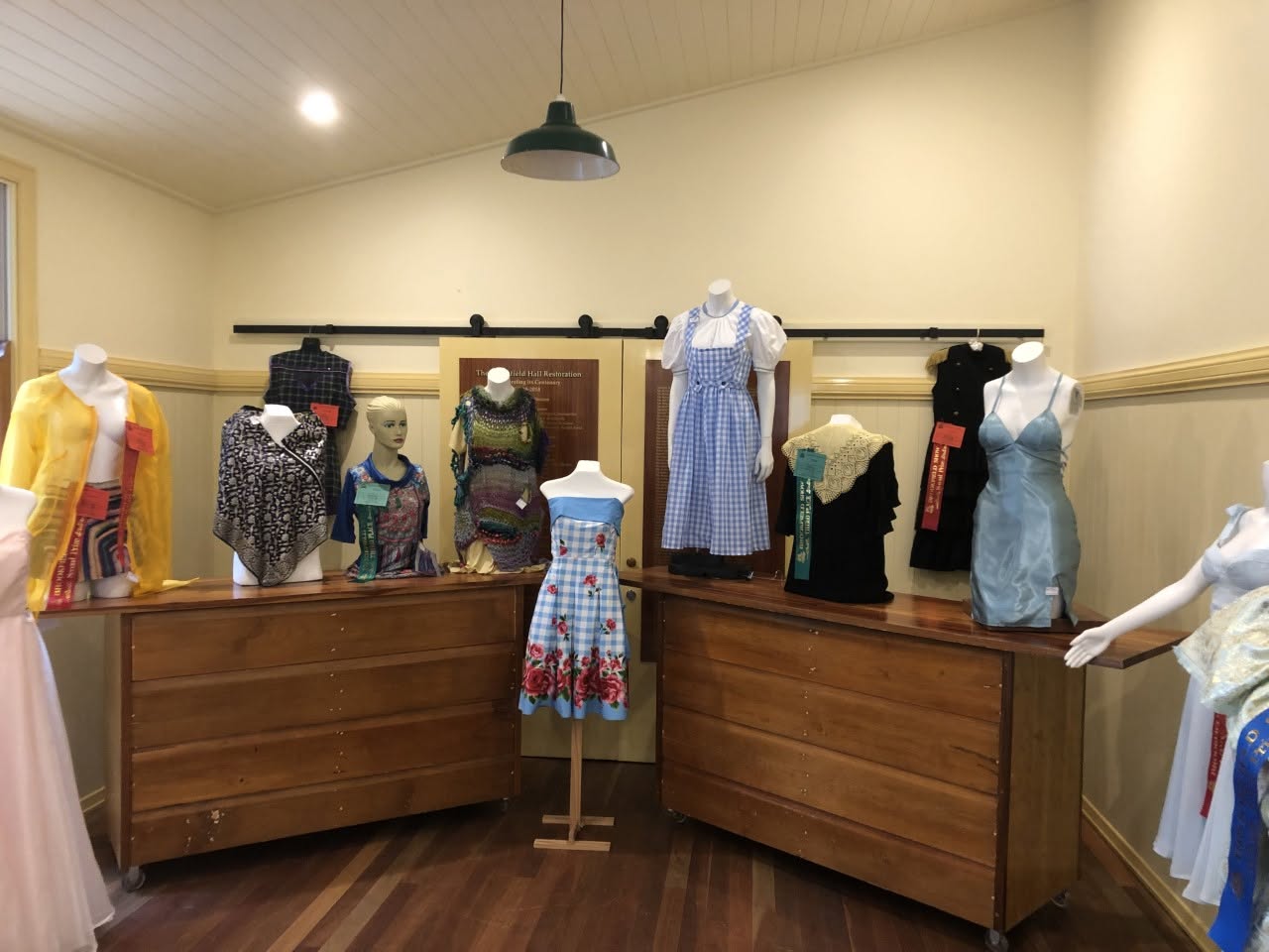 Brookfield Show – Needlecraft & Patchwork Exhibition Image showcasing dresses and crafts.